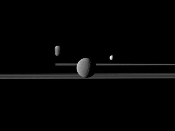 http://i1280.photobucket.com/albums/a490/Ken_Willinger/the-cassini-spacecraft-observes-three-of-saturns-moons-set-against-the-darkened-night-side-of-the-planet_zps8bee58c8.jpg